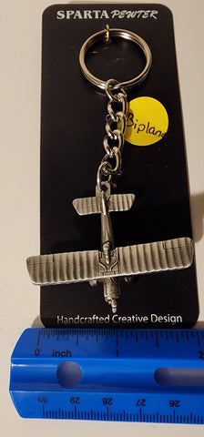 Llavero de avión biplano de peltre