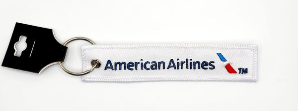 Llavero bordado en azul y blanco con el logotipo de American Airlines