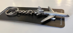 Llavero de peltre con el avión de pasajeros McDonnell Douglas MD-11 (MD11)