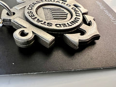 Llavero de peltre con el logotipo del escudo de la Guardia Costera de los EE. UU. (USCG)